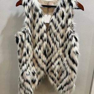 Black and white fur vest size med never worn